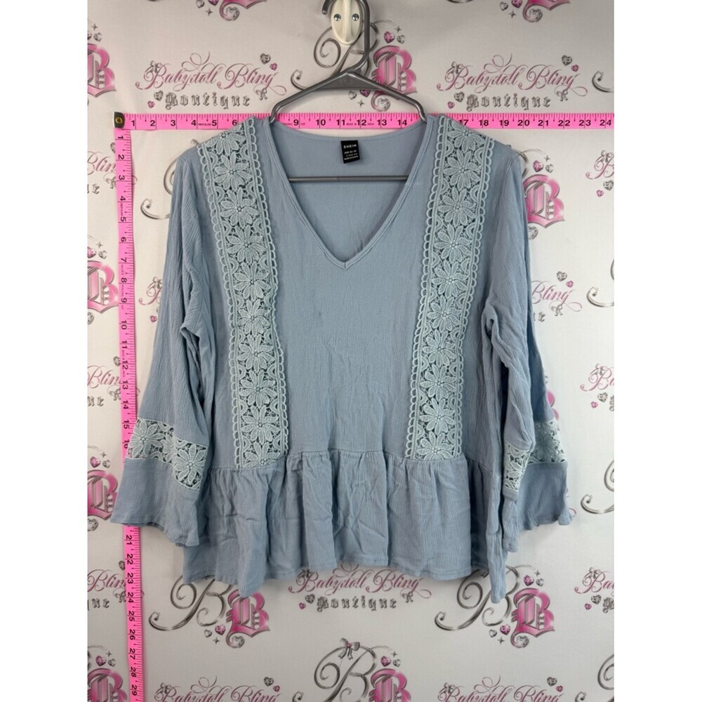 SHEIN V-Neck Crochet Panel Peplum Tunic Light Blue with a floral panel